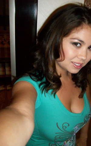 18 year old girl Megan Rain removes her sandals and then clothes to pose naked